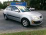 2007 Silver Metallic /Gray Kia Rio Base (KNADE123876) with an 1.6L L4 DOHC 16V engine, Automatic transmission, located at 3120 W Tennessee St, Tallahassee, FL, 32304-1002, (850) 575-6702, 30.458841, -84.349648 - Used Car Supermarket is proud to present you with this loaded immaculate 2007 Kia Rio Sedan with low miles. Used Car Supermarket prides itself in offering you the finest pre-owned vehicle in Tallahassee. Used Car Supermarket has been locally family owned and operated for over 50 years. Our Rio Sedan- Photo#0