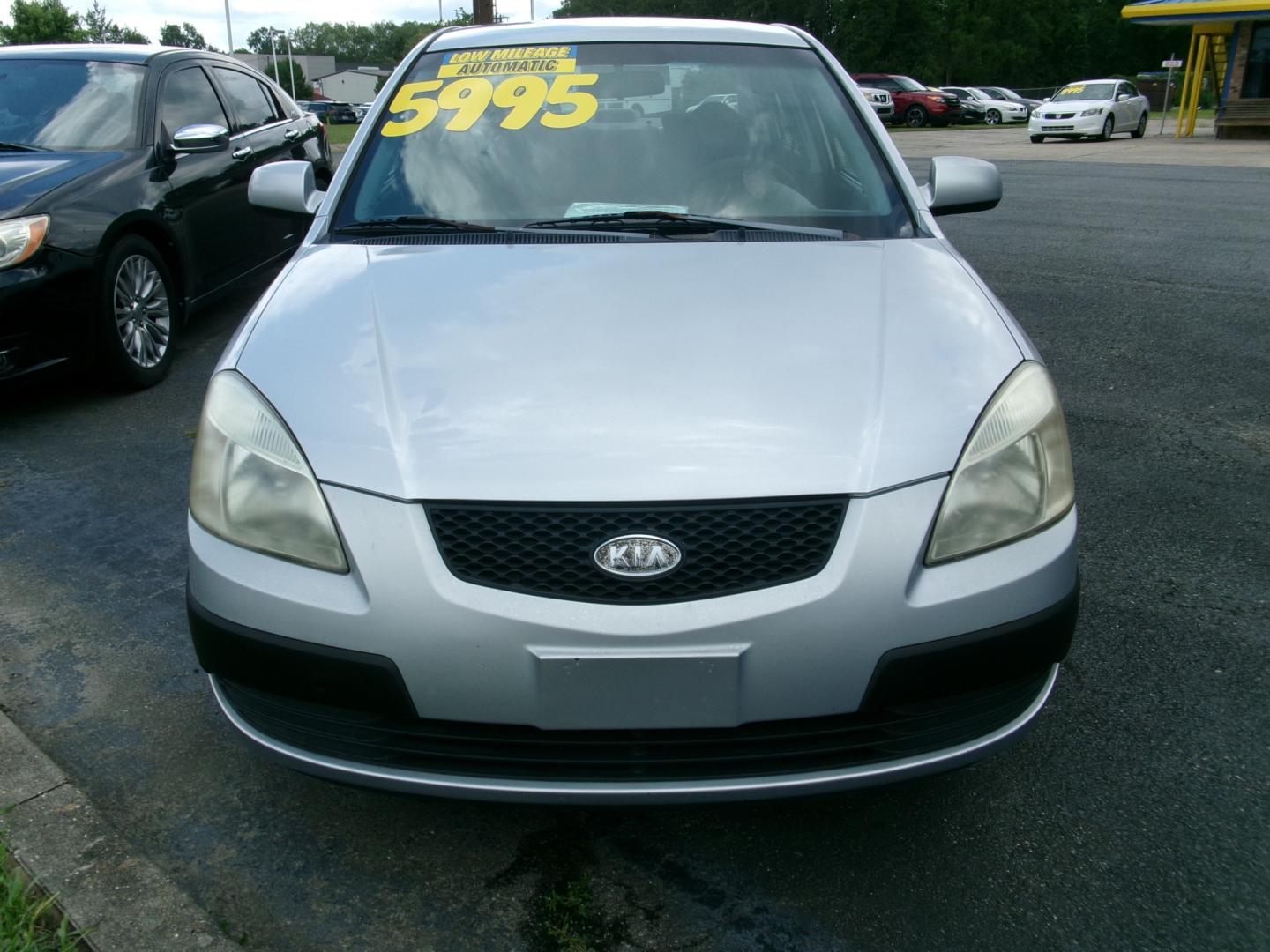2007 Silver Metallic /Gray Kia Rio Base (KNADE123876) with an 1.6L L4 DOHC 16V engine, Automatic transmission, located at 3120 W Tennessee St, Tallahassee, FL, 32304-1002, (850) 575-6702, 30.458841, -84.349648 - Used Car Supermarket is proud to present you with this loaded immaculate 2007 Kia Rio Sedan with low miles. Used Car Supermarket prides itself in offering you the finest pre-owned vehicle in Tallahassee. Used Car Supermarket has been locally family owned and operated for over 50 years. Our Rio Sedan- Photo#2