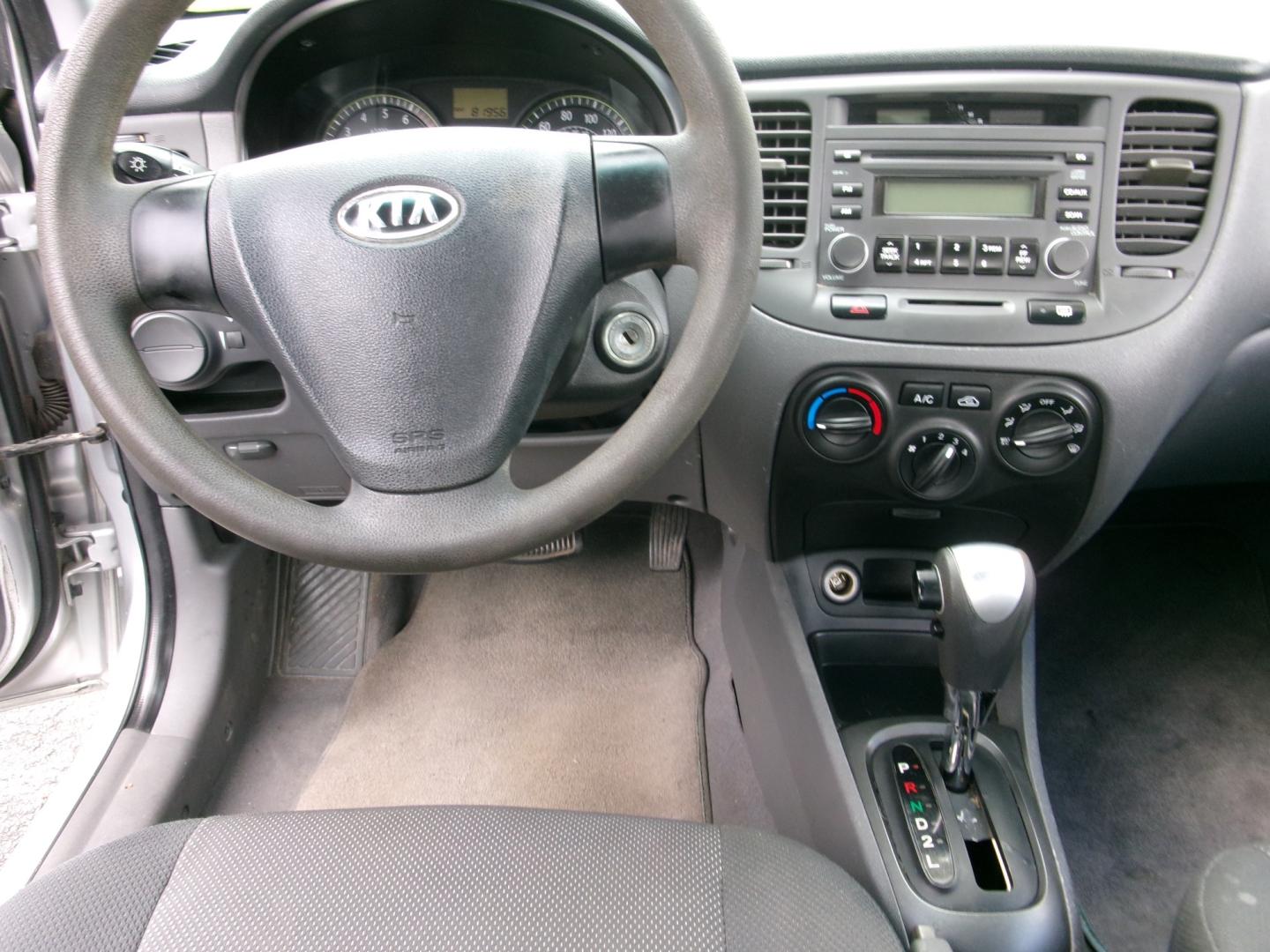 2007 Silver Metallic /Gray Kia Rio Base (KNADE123876) with an 1.6L L4 DOHC 16V engine, Automatic transmission, located at 3120 W Tennessee St, Tallahassee, FL, 32304-1002, (850) 575-6702, 30.458841, -84.349648 - Used Car Supermarket is proud to present you with this loaded immaculate 2007 Kia Rio Sedan with low miles. Used Car Supermarket prides itself in offering you the finest pre-owned vehicle in Tallahassee. Used Car Supermarket has been locally family owned and operated for over 50 years. Our Rio Sedan- Photo#4