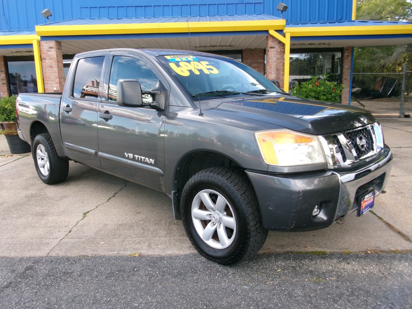 2011 Charcoal /Gray Nissan Titan SV Crew Cab 4WD SWB (1N6AA0EJ4BN) with an 5.6L V8 DOHC 32V engine, Automatic transmission, located at 3120 W Tennessee St, Tallahassee, FL, 32304-1002, (850) 575-6702, 30.458841, -84.349648 - Used Car Supermarket is proud to present you with this loaded immaculate 2011 Nissan Titan SV Crew Cab 4x4. Used Car Supermarket prides itself in offering you the finest pre-owned vehicle in Tallahassee. Used Car Supermarket has been locally family owned and operated for over 50 years. Our Titan 4x- Photo#0
