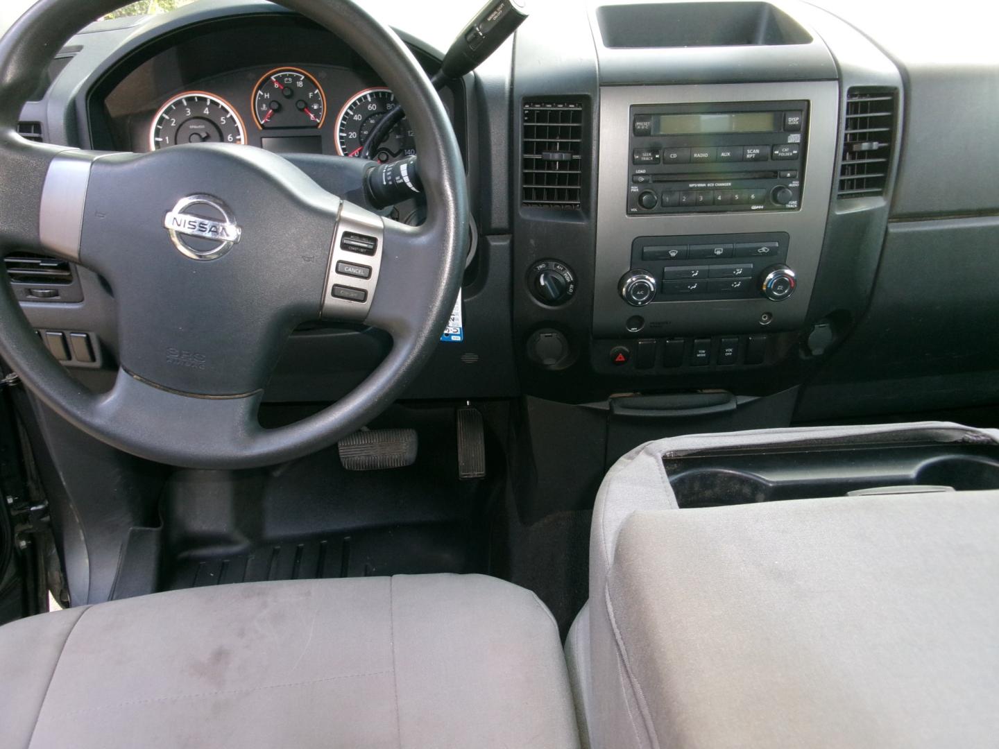 2011 Charcoal /Gray Nissan Titan SV Crew Cab 4WD SWB (1N6AA0EJ4BN) with an 5.6L V8 DOHC 32V engine, Automatic transmission, located at 3120 W Tennessee St, Tallahassee, FL, 32304-1002, (850) 575-6702, 30.458841, -84.349648 - Used Car Supermarket is proud to present you with this loaded immaculate 2011 Nissan Titan SV Crew Cab 4x4. Used Car Supermarket prides itself in offering you the finest pre-owned vehicle in Tallahassee. Used Car Supermarket has been locally family owned and operated for over 50 years. Our Titan 4x- Photo#5
