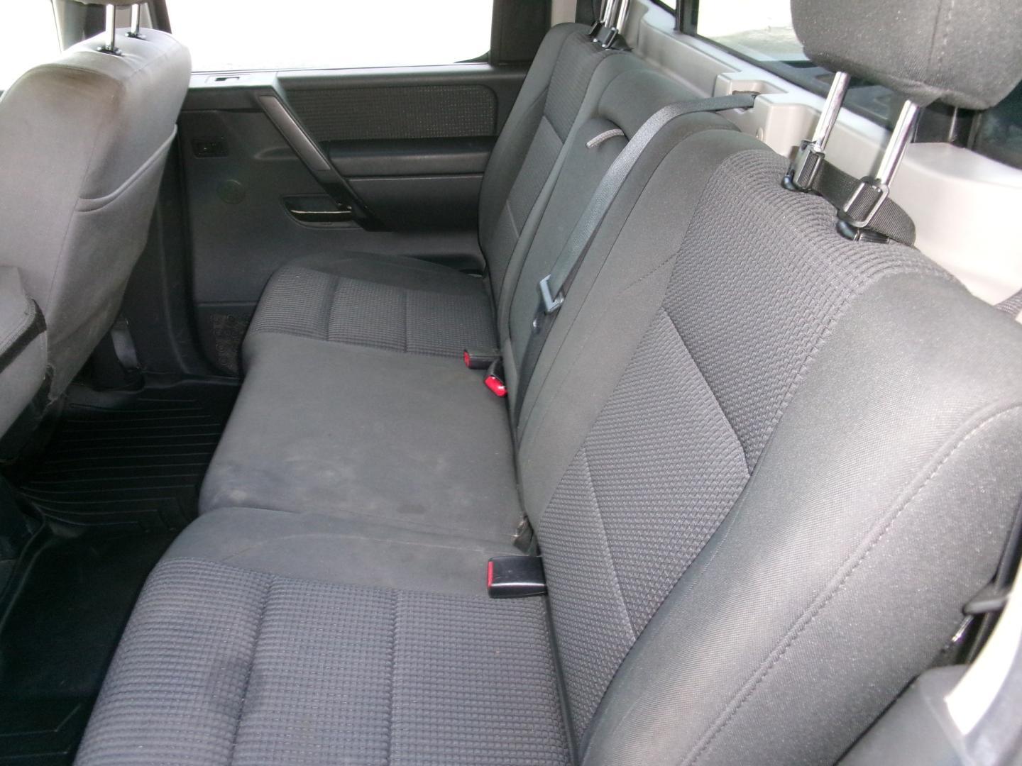 2011 Charcoal /Gray Nissan Titan SV Crew Cab 4WD SWB (1N6AA0EJ4BN) with an 5.6L V8 DOHC 32V engine, Automatic transmission, located at 3120 W Tennessee St, Tallahassee, FL, 32304-1002, (850) 575-6702, 30.458841, -84.349648 - Used Car Supermarket is proud to present you with this loaded immaculate 2011 Nissan Titan SV Crew Cab 4x4. Used Car Supermarket prides itself in offering you the finest pre-owned vehicle in Tallahassee. Used Car Supermarket has been locally family owned and operated for over 50 years. Our Titan 4x- Photo#7